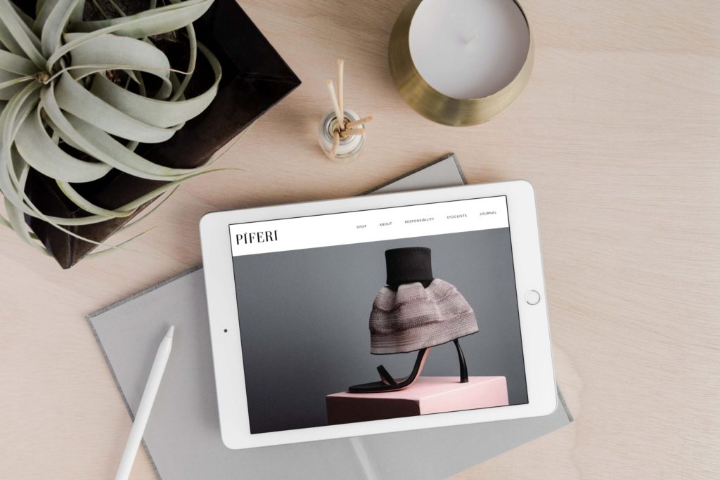 iPad displaying the Website of luxury fashion brand Piferi, on the DO Digital Marketing agency desk