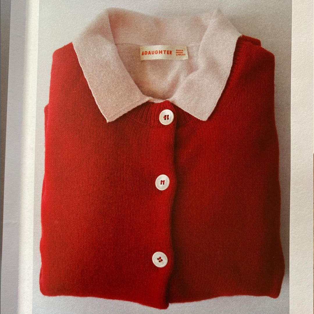 &daughter red cardigan folded